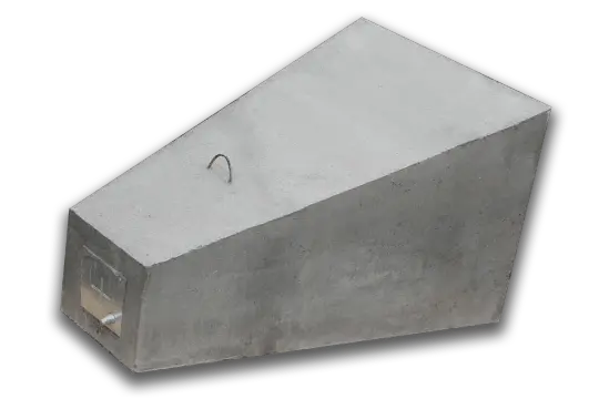 Betonowy reper geodezyjny z metalową płytką i uchwytem.